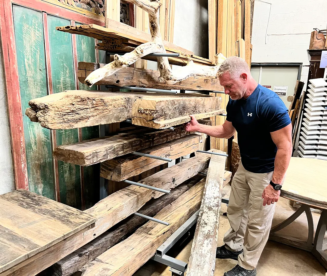 John looking at different pieces of wood