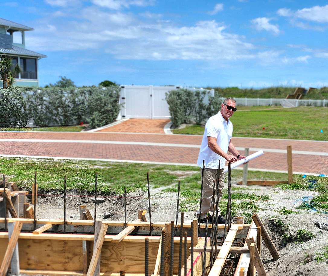 John at the site of a home build